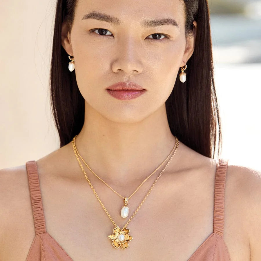 Model wearing Brighton Everbloom pearl gold drop french wire earrings
