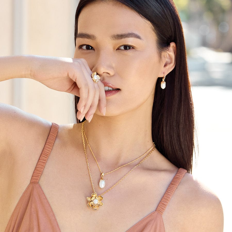 Model wearing Brighton Everbloom gold pearl drop necklace
