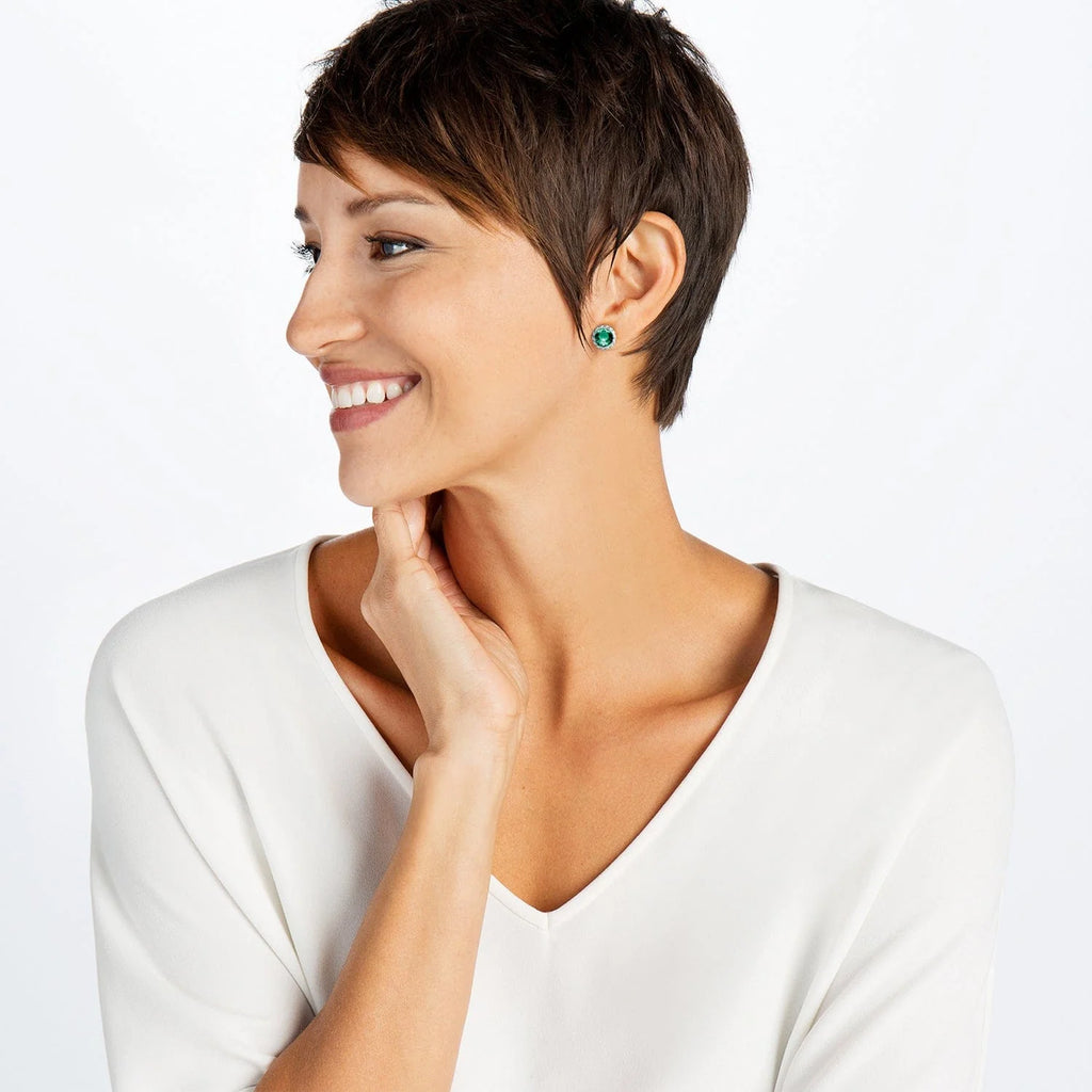 Model wearing Emerald Brighton Iris stud earrings