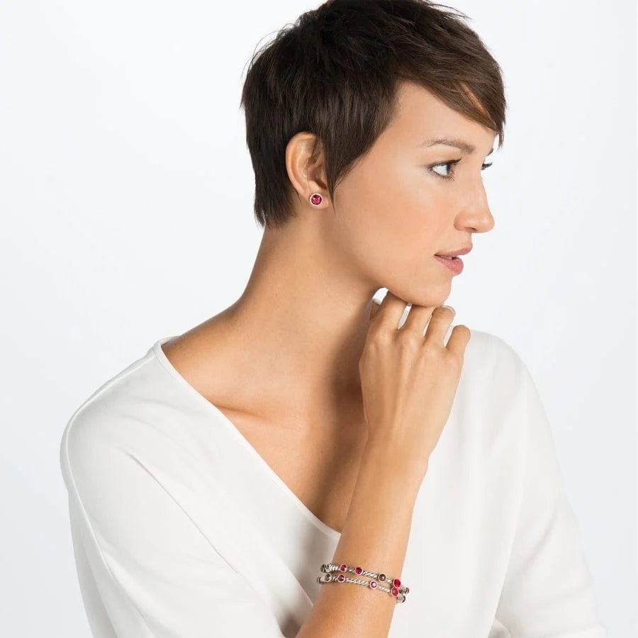 Model wearing Ruby Brighton Iris stud earrings