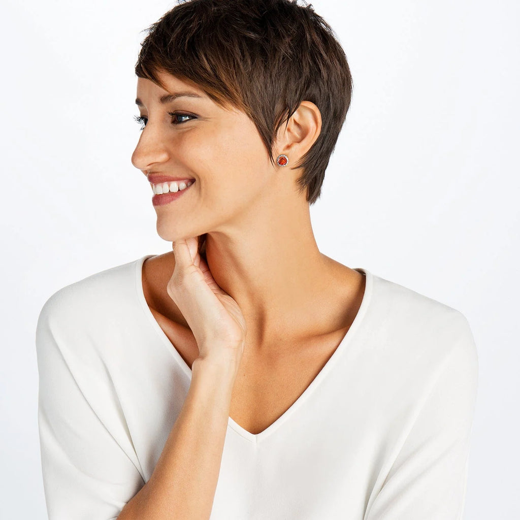 Model wearing Silver-Pink Brighton Iris stud earrings