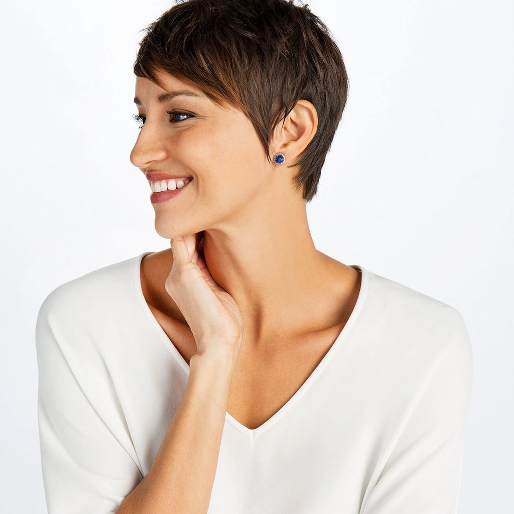 Model wearing Silver-Tanzanite Brighton Iris stud earrings