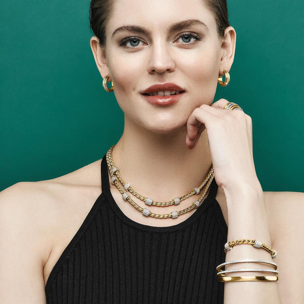 Model wearing Brighton gold Meridian necklace