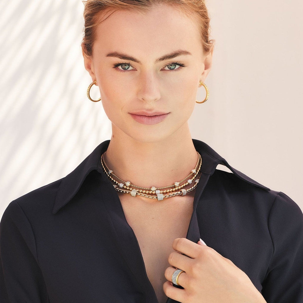 Model wearing Brighton gold Meridian necklace