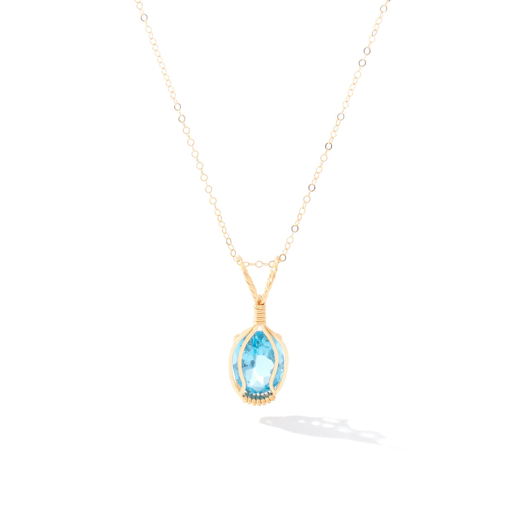 Ronaldo Jewelry Gemstone Pendant in 14K Gold Artist Wire with the Blue Topaz Stone